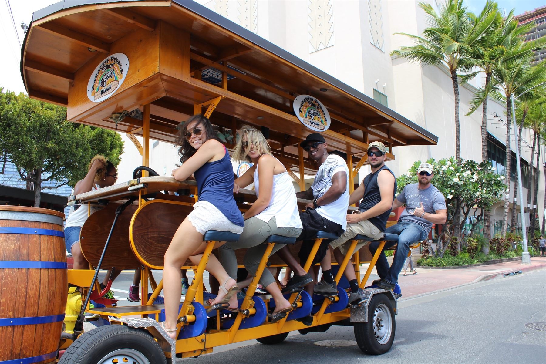 Group on the 15-passenger party bike on the Beer Lover's Tour in Kaka'ako